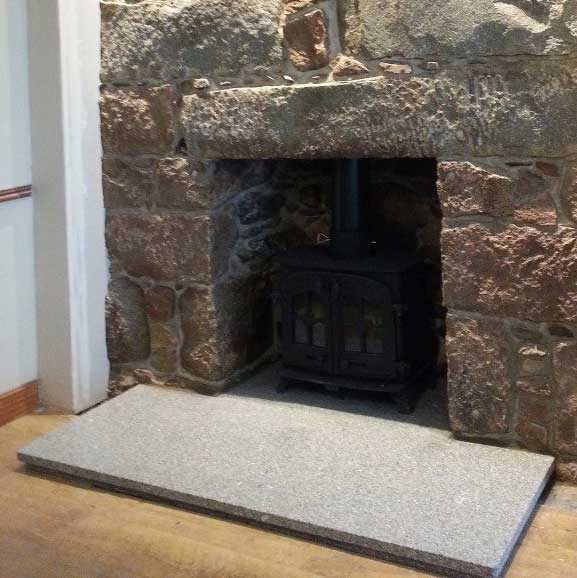 Grey granite fireplace