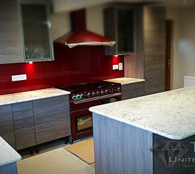 White granite worktops in kitchen