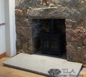 Grey granite fireplace