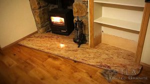 Brown and white granite fireplace